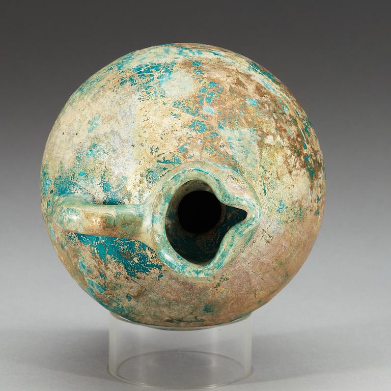 EWER, pottery. Turquoise glaze. Persia 13th century, probably Kashan.