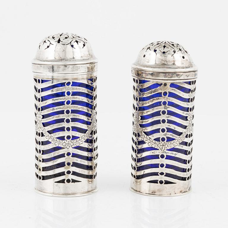 A pair of English salt and pepper shakers, silver and glass, London 1802-3, unidentified makers's mark.