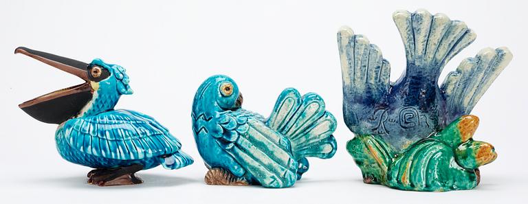 Three Gunnar Nylund stoneware figures, a pelican and two parrots, Rörstrand.