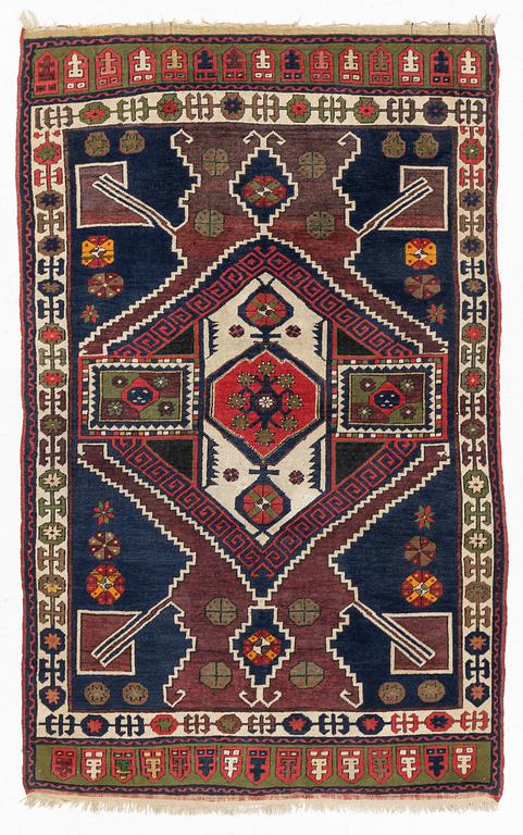 A likely old Anatol/Caucasus rug, c. 207 x 130 cm.