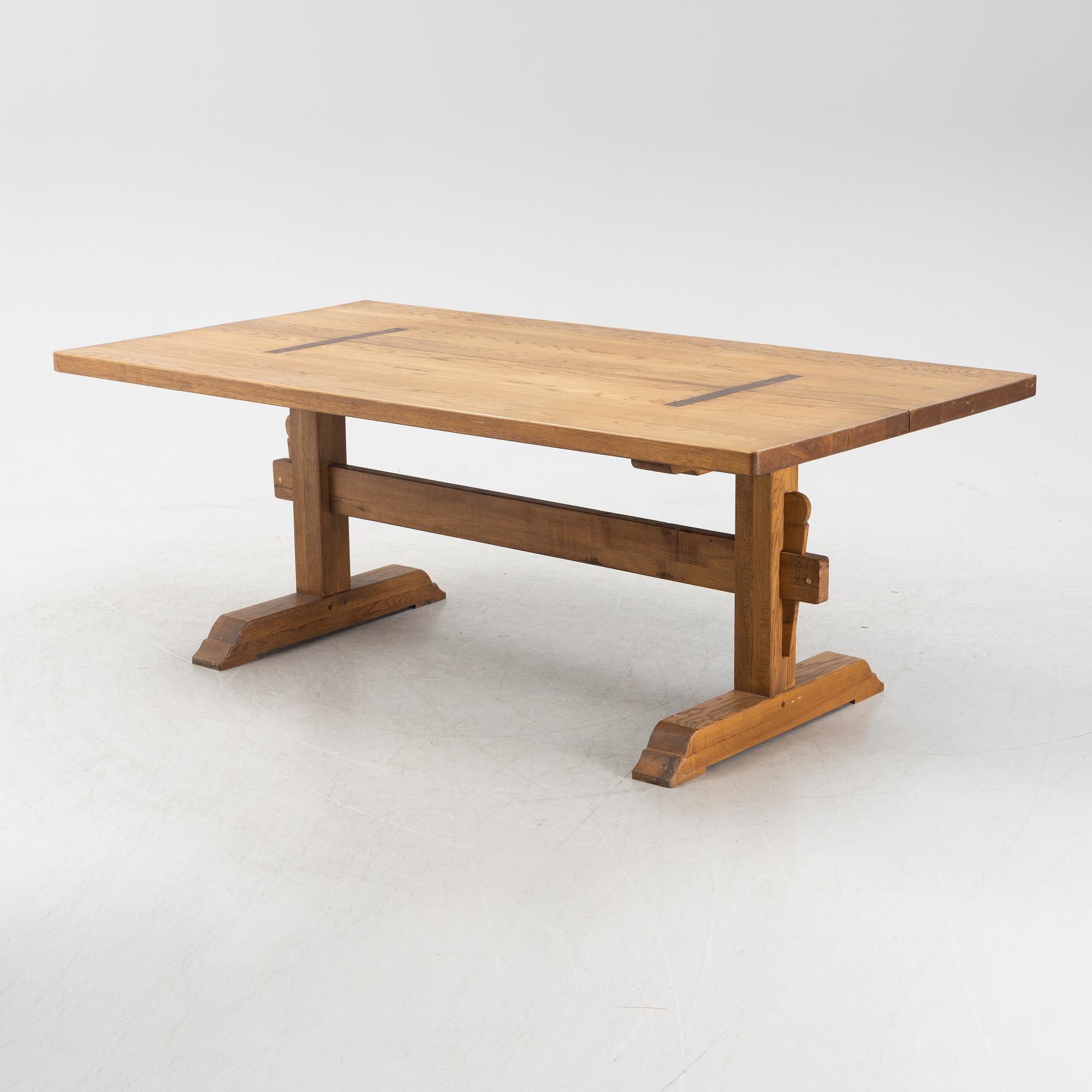 An oak trestle table.