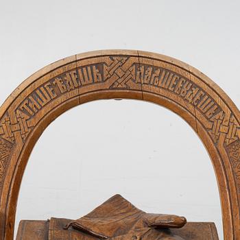 Armchair, after a design by Vasily Shutov called 'Arc, Axes and Mittens' Russia late 19th century.