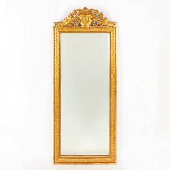 A Gustavian Style Mirror with Table, circa 1900.