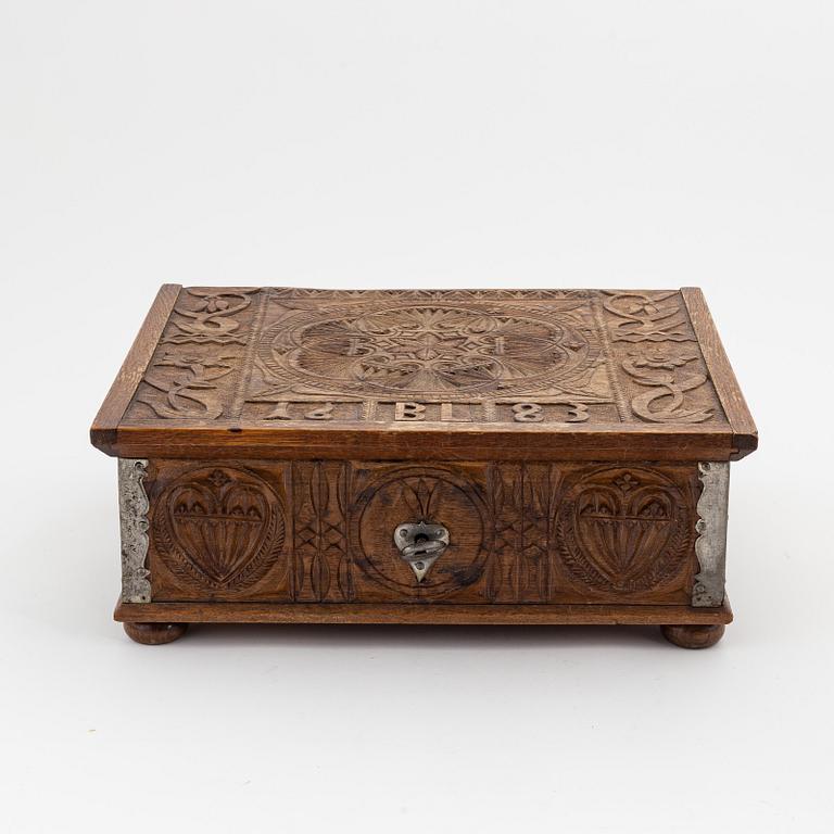A Swedish baroque oak chest, presumably Westrogothia, dated 1683.