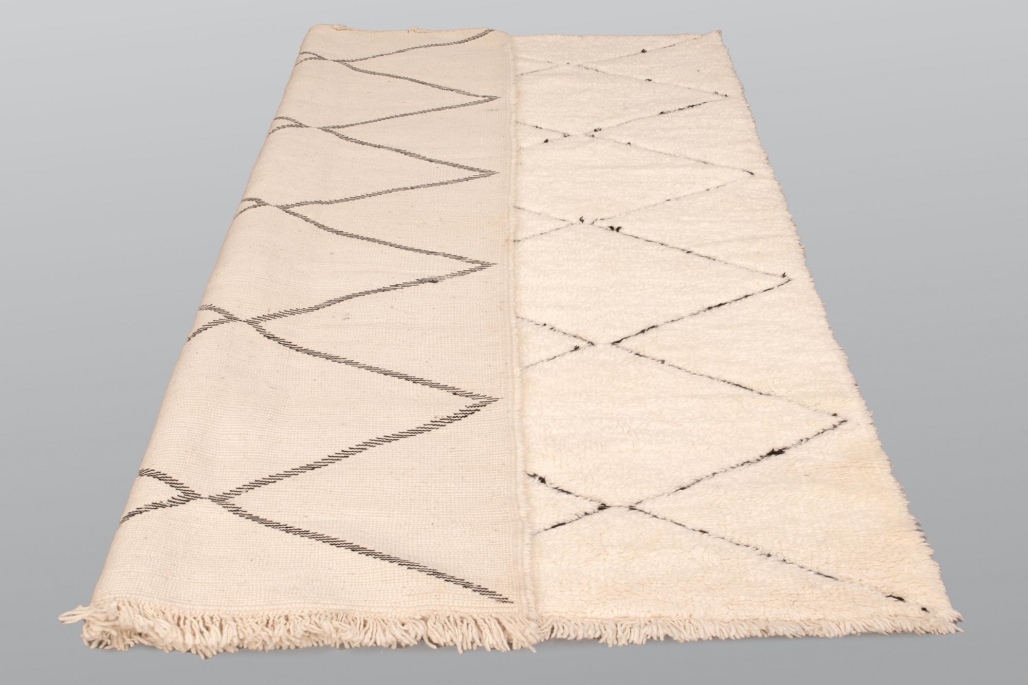 A Moroccan carpet, 247 x 164 cm.