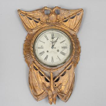 A wall clock, circa 1900.