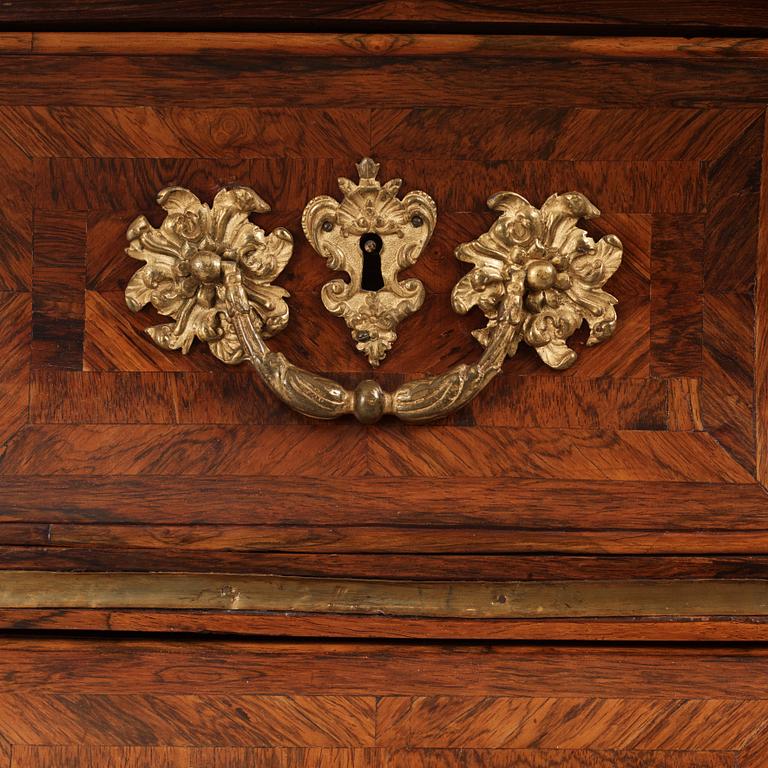 A Swedish early rococo parquetry, ormolu-mounted and marble commode, presumably by S. Pasch or J. Wulf , ca. 1740.