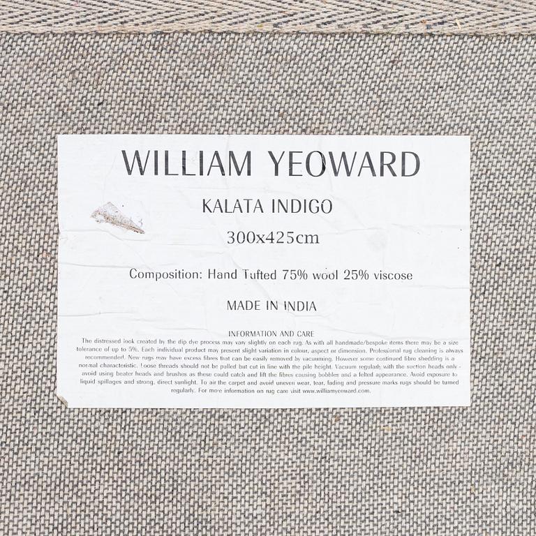 William Yeoward, a 'Kalata Indigo' carpet, circa 425 x 300 cm.