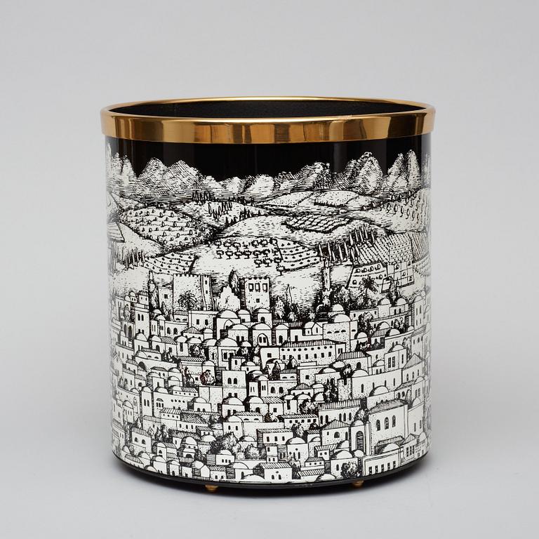 A Piero Fornasetti wastepaper bin, Milan, Italy.