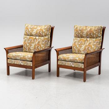 Arne Norell, a pair of 'Rotang' easy chairs, Norell Möbel AB, Sweden.