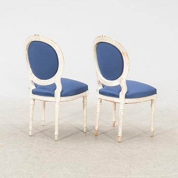 A pair of painted Louis XZVI style chairs first half of the 20th century.