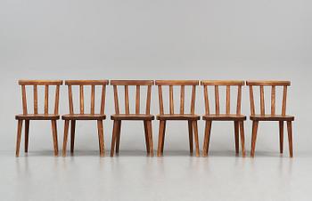 Axel Einar Hjorth, a set of six stained pine "Utö" chairs, Nordiska Kompaniet, Sweden, 1930s.