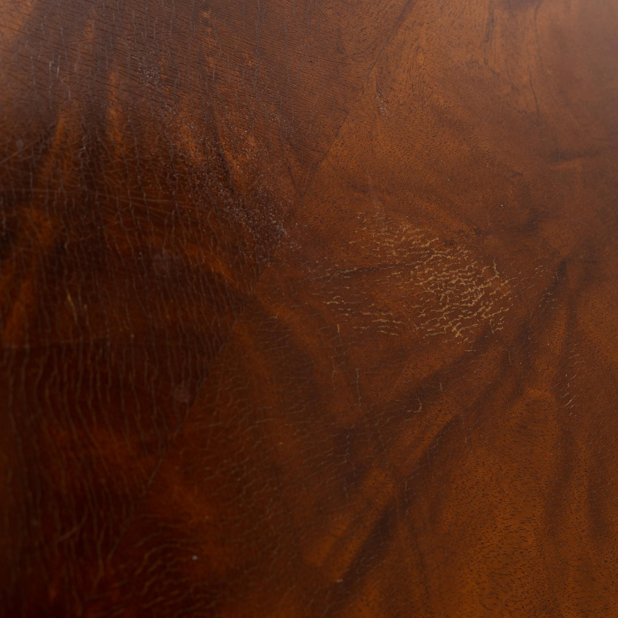 A 1940s mahogany coffee table.