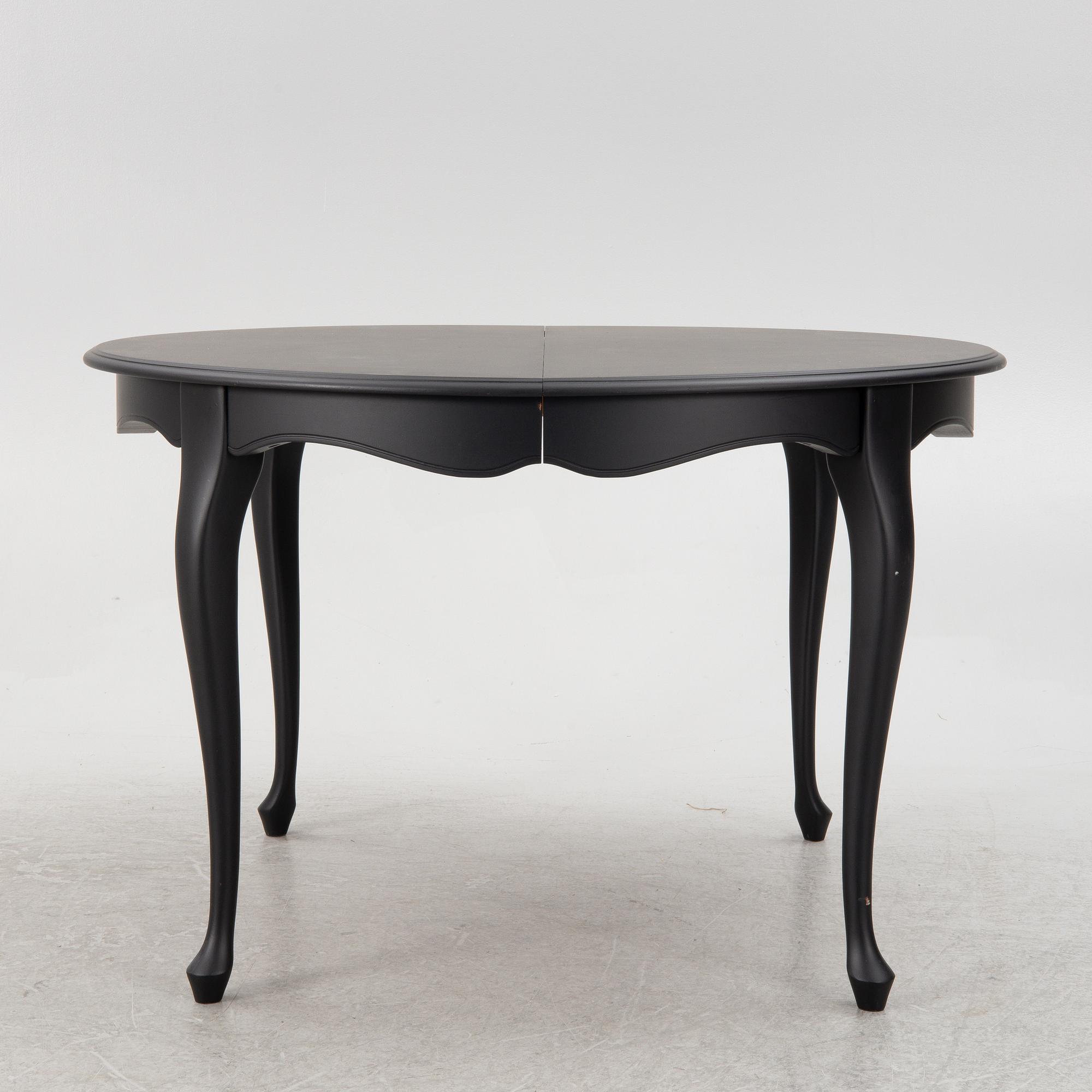 A rococo style dining table, second half oif the 20th century.