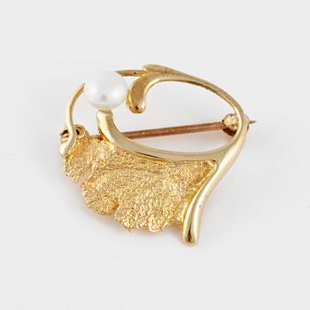 BROSCH, 14K guld samt odlad pärla, stämplad OE. Vikt 3,6 gram.