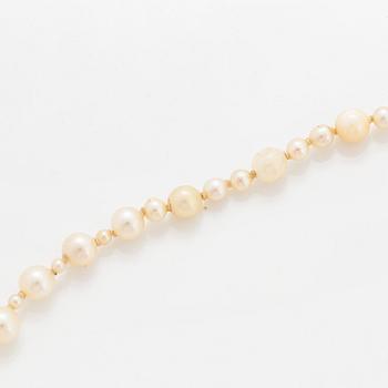 A cultured pearl necklace with a WA Bolin clasp.