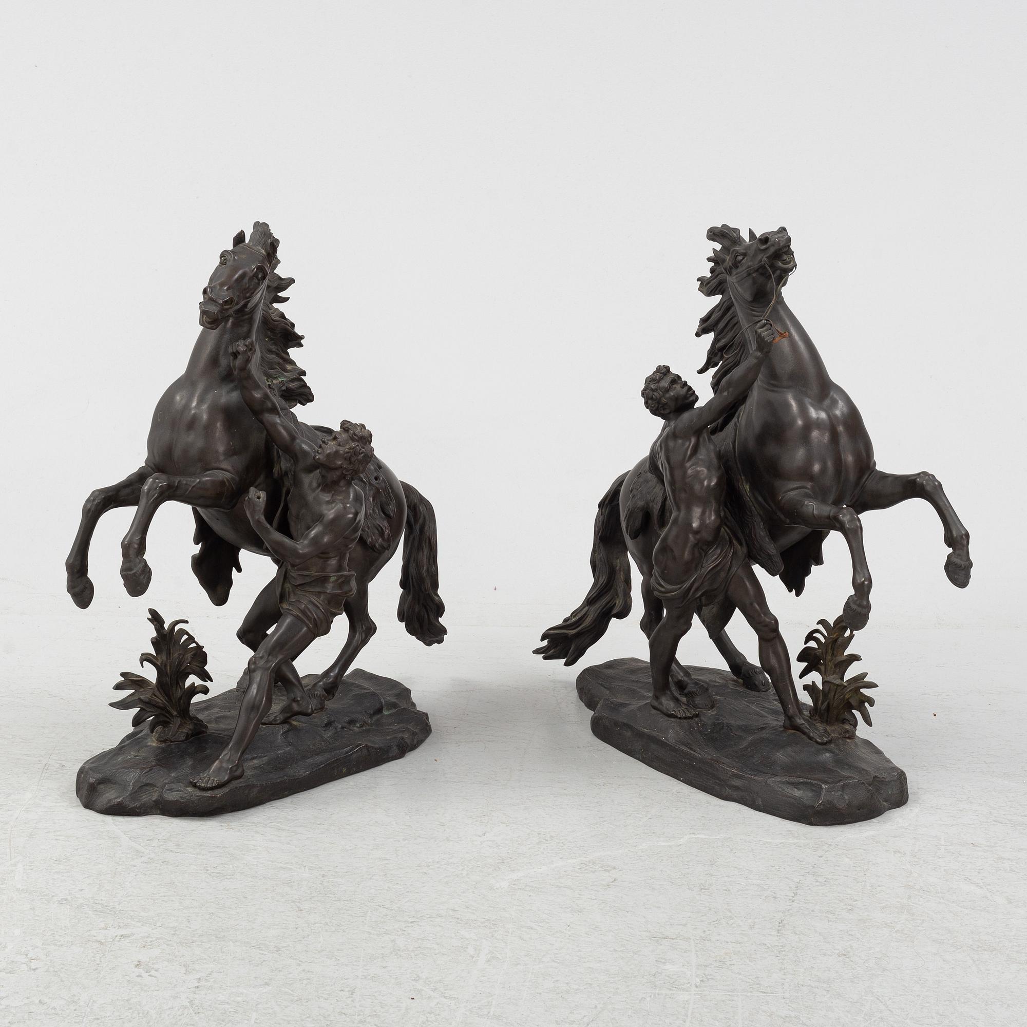 Guilliaume Coustou, after, a pair of bronze sculptures.