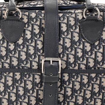 CHRISTIAN DIOR, a monogram canvas weekend bag.