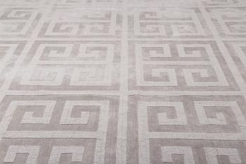 A Layered "Wool Cubes" carpet, 390x620 cm.