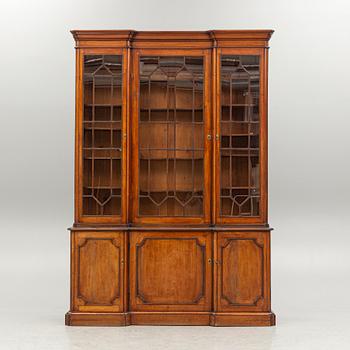 A display cabinet, England, circa 1900.