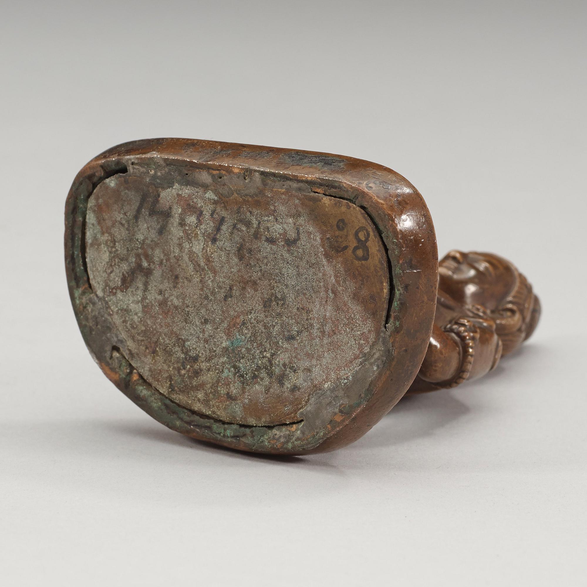 A copper alloy figure of Amitayus, Tibet/Nepal, presumably late 19th century/early 20th century.