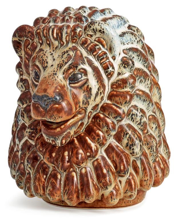 A Gunnar Nylund stoneware figure of a lion's head, Rörstrand.