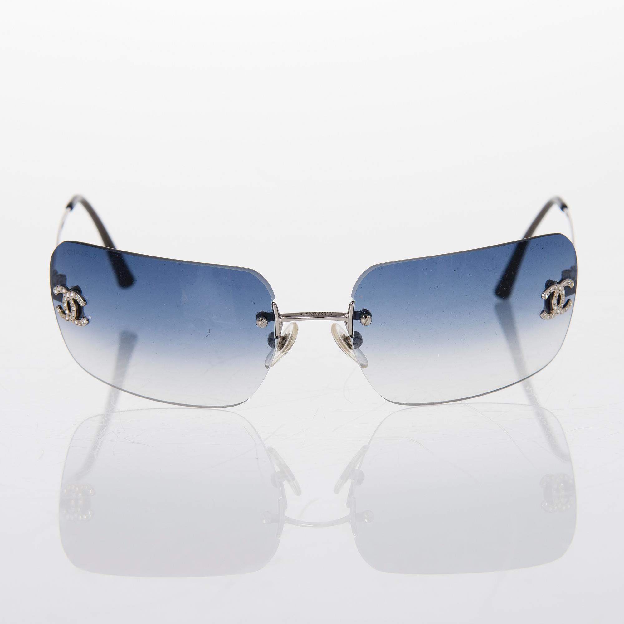 Prada and Chanel Sunglasses.