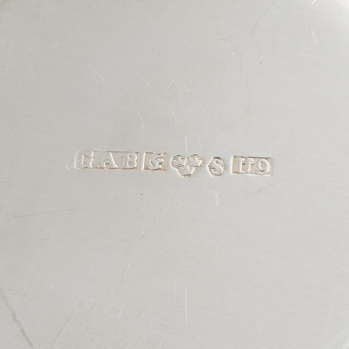 A set of eight parcel gilt Swedish silver vodka cups, bearing the mark of GAB, Stockholm, 1966-1970.
