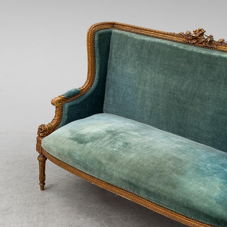 A Louis XVI-style sofa, ca 1900.
