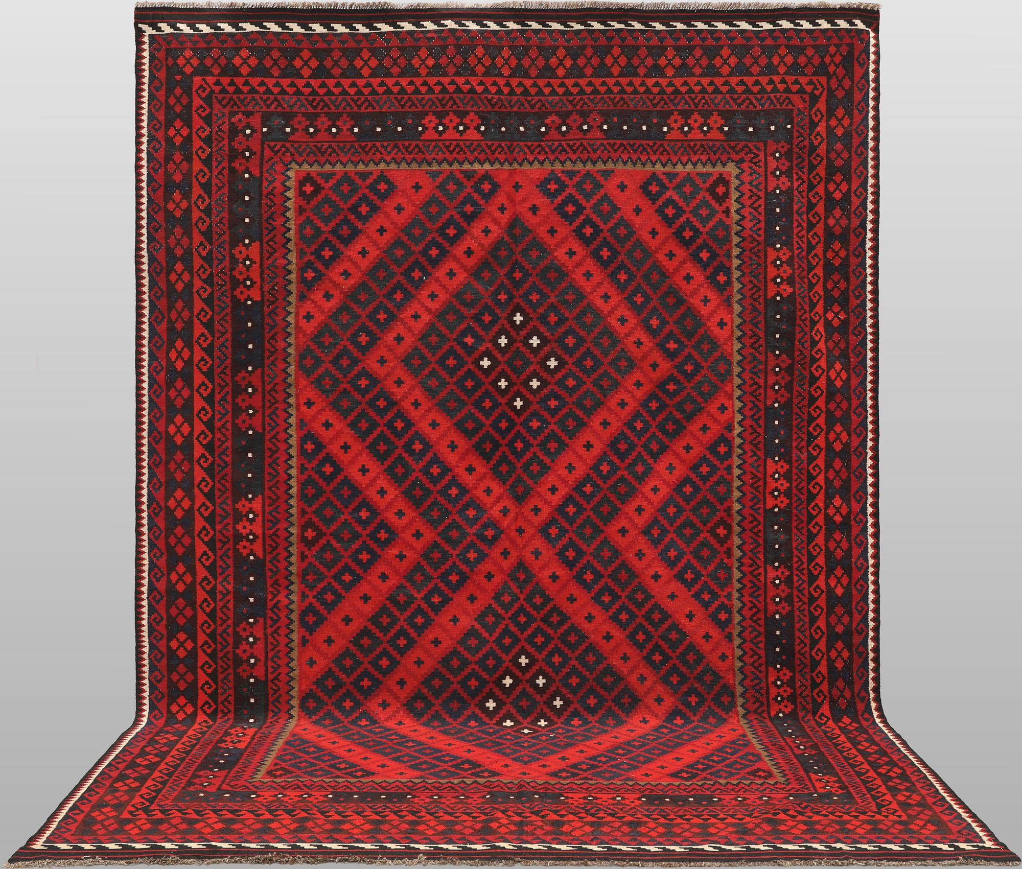 A Afghan kelim carpet, 361 x 241 cm.