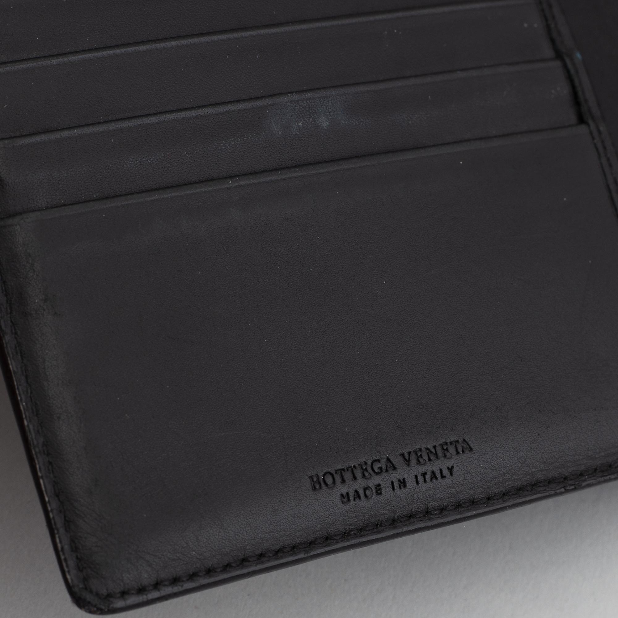 Bottega veneta, a black leather wallet.