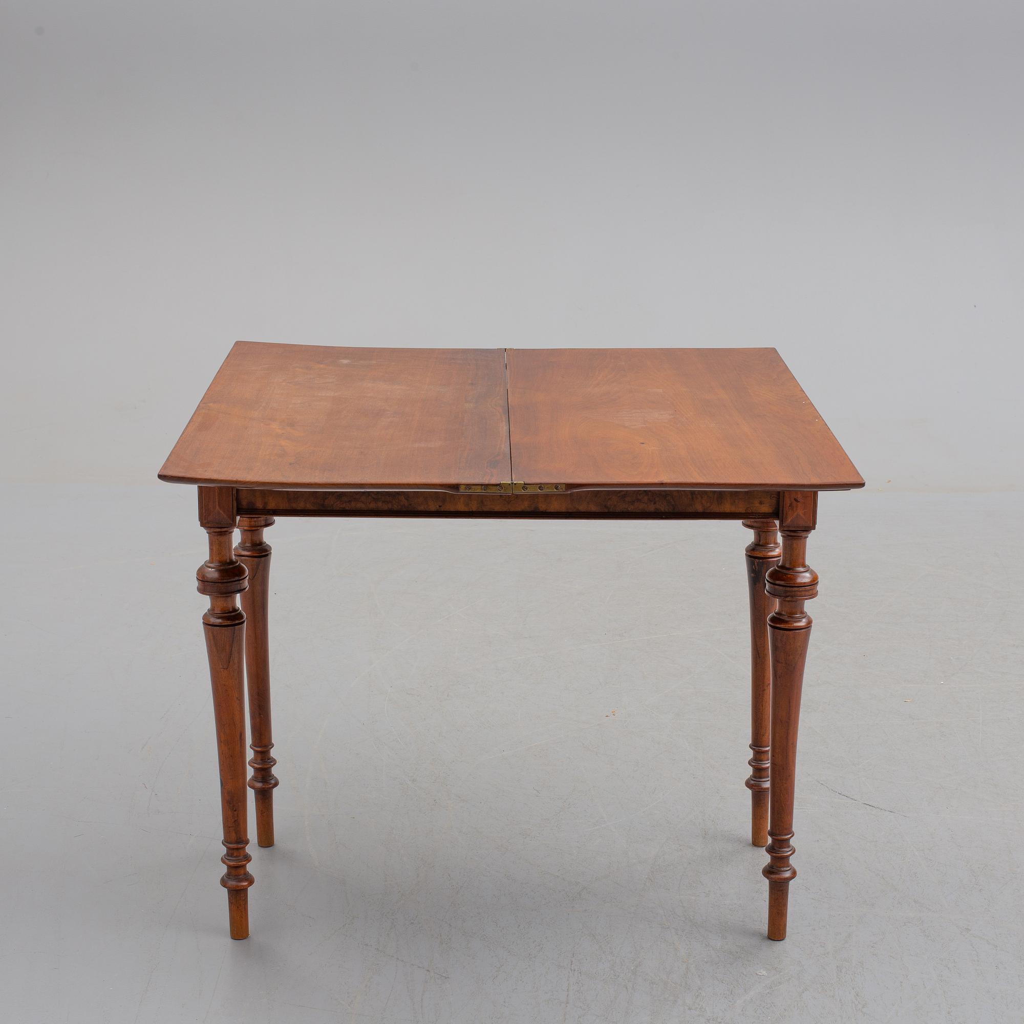 A late 19th century mahogany card table.