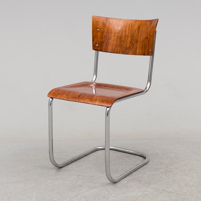 A 1930s writing desk by Jindrich Halabala and chair by Mart Stam.
