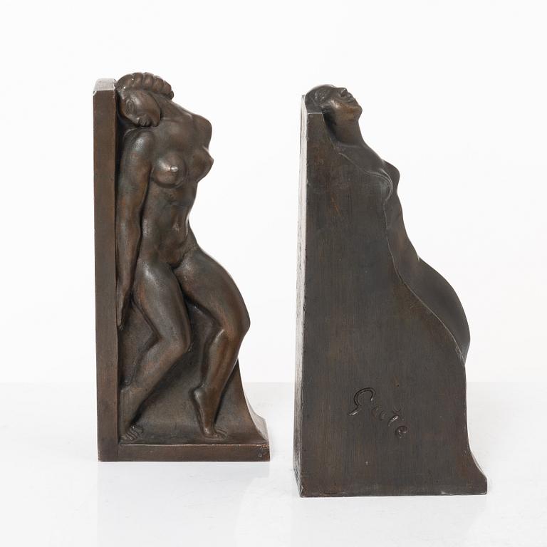 Axel Gute, two patinated metal bookends.