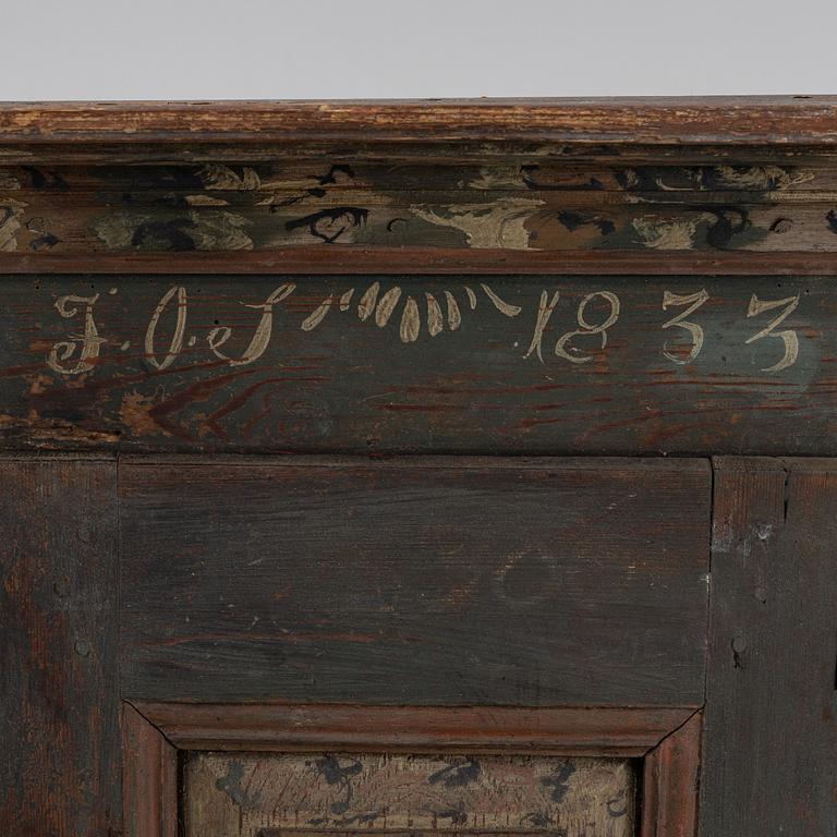 A Swedish provincial wall hanging cabinet, 1833.