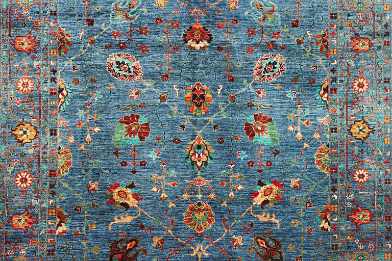 A Khorjin carpet with a Ziegler pattern, c. 307 x 252 cm.