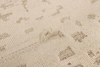 A Moroccan carpet, a. 292 x 246 cm.