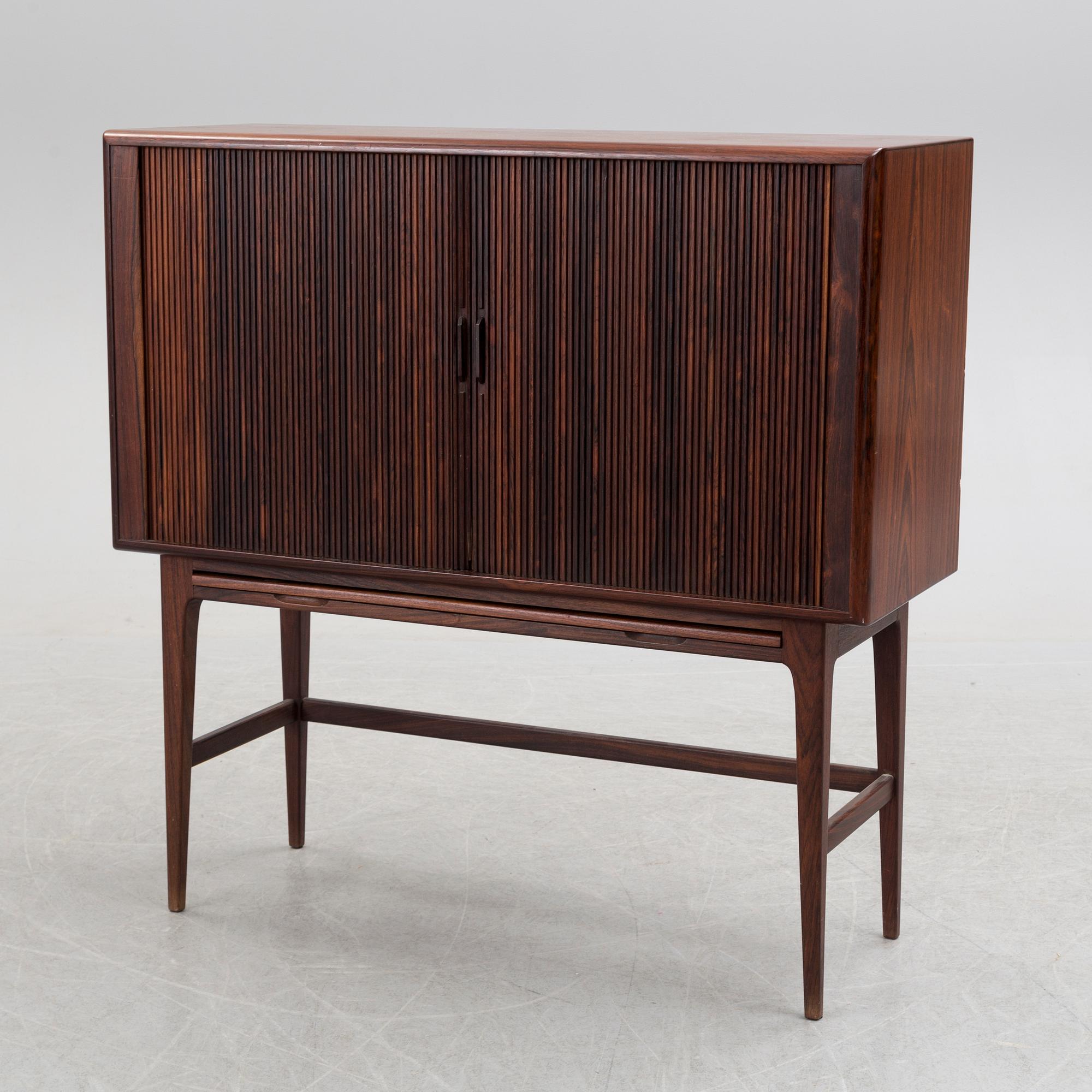 KURT ØSTERVIG, a Danish rosewood veneered drinks cabinet, 1960's.
