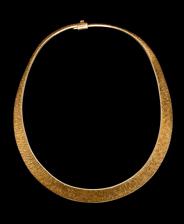 A gold necklace, 1970's.