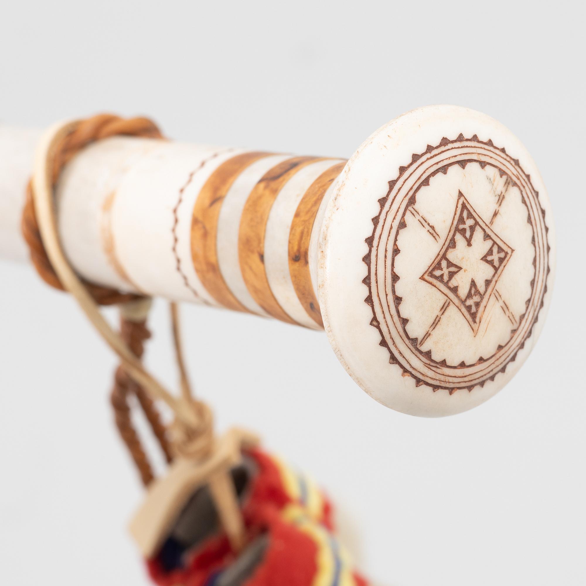 Lars Levi Sunna, a walking stick.