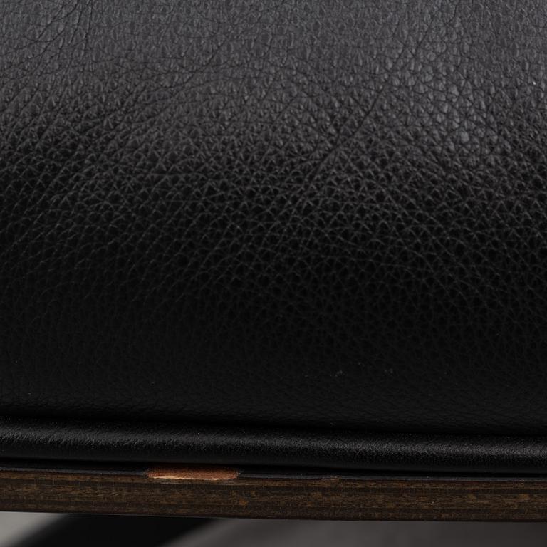 Charles & Ray Eames, an "Eames Lounge Chair" with ottoman, Vitra, 21st century.