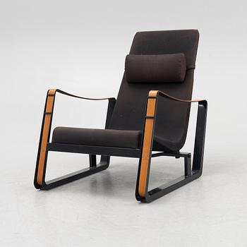 Jean Prouvé, a 'Cité' easy chair, Vitra, 2012.