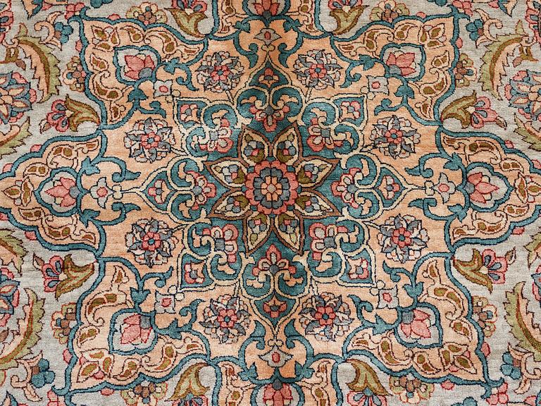 A CARPET, an old silk Turkey, ca 428 x 299-307 cm.