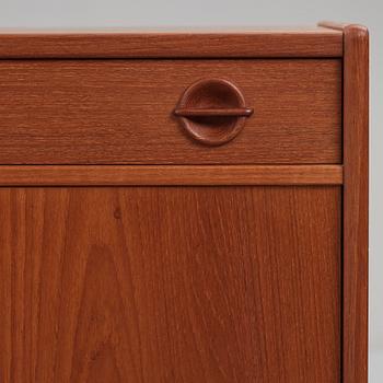 A late 20th Century teak veneered sideboard.
