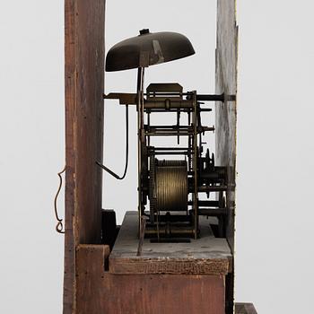 A mahognay long case clock from around the year 1800, H Bunyan Lincoln.