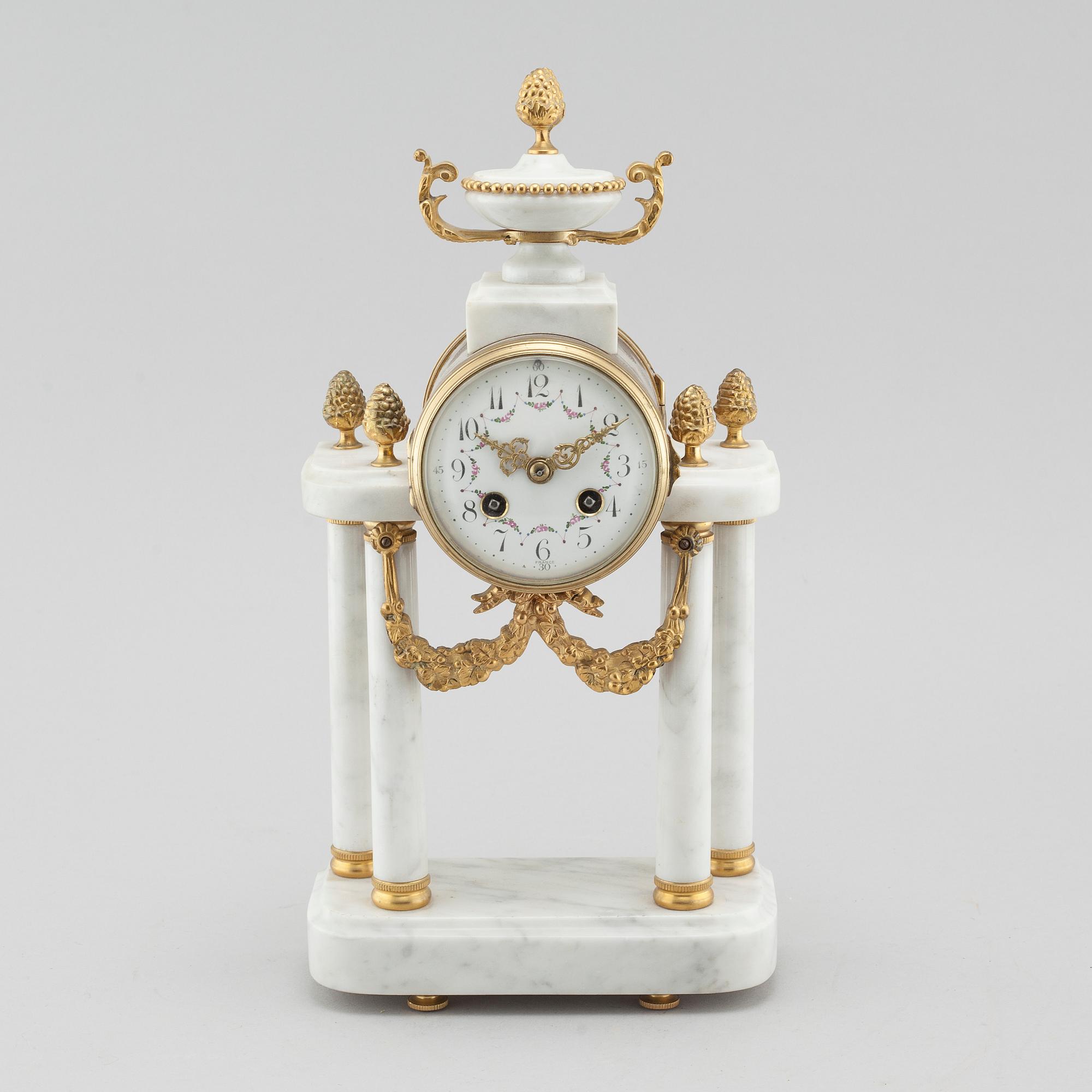 A French Louis XVI-style mantle clock, first half of the 20th century.