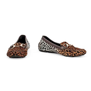 578. GUCCI, a pair of leopard patterned loafers.