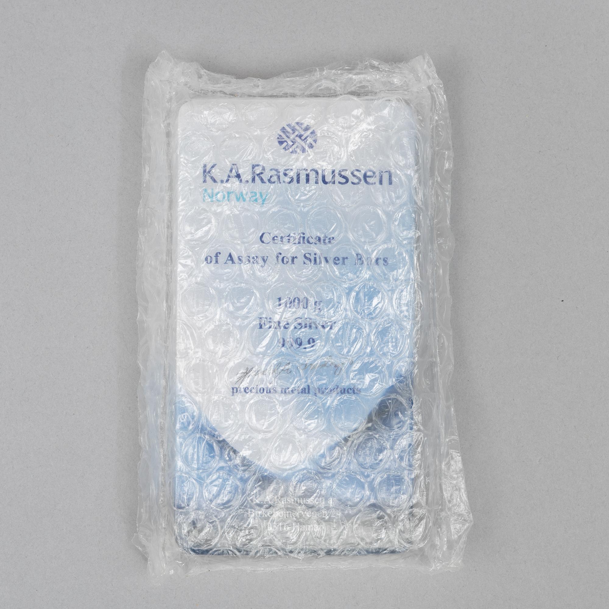 Silvertacka, 1000 gram finsilver, K.A. Rasmussen, Norge.
