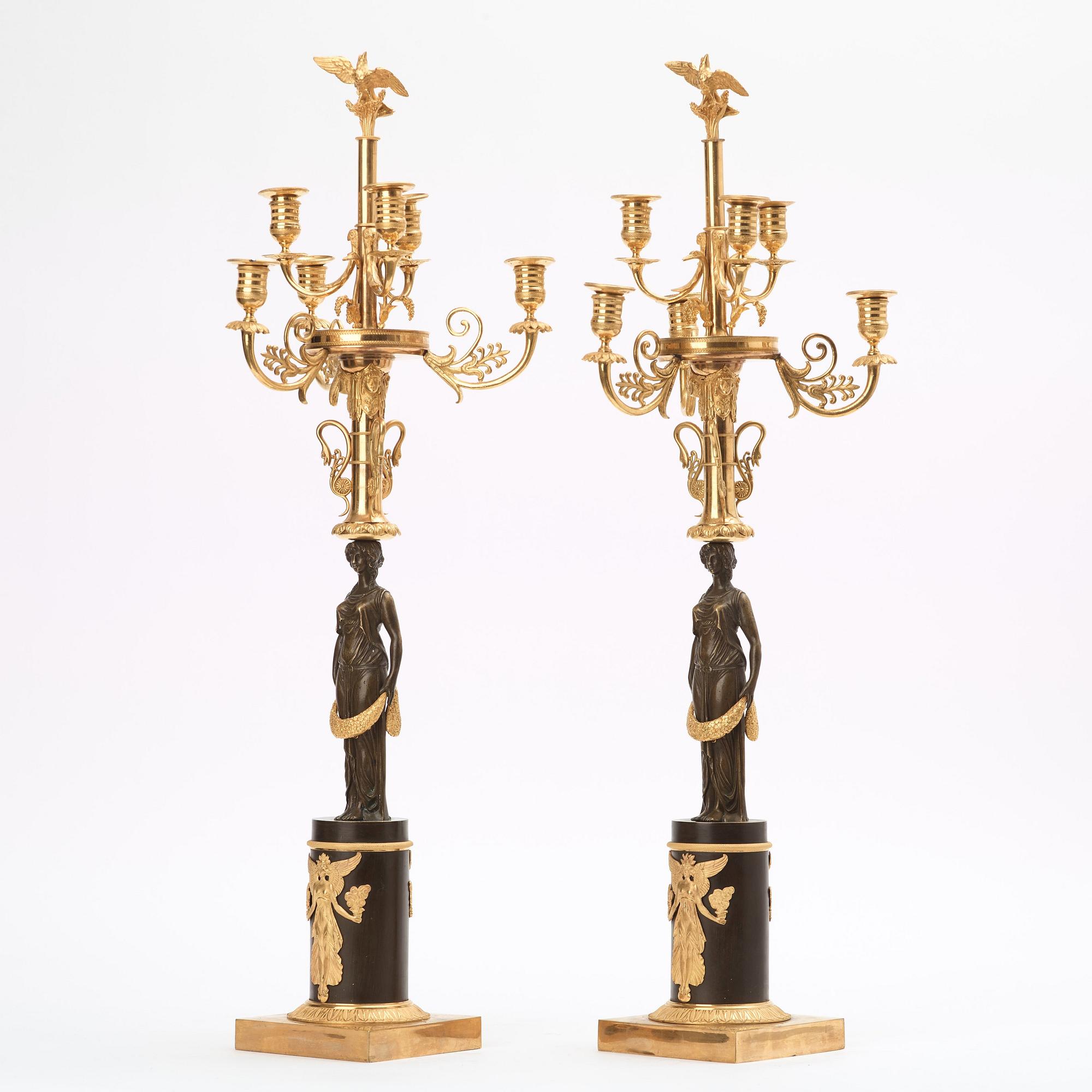 A pair of Empire early 19th century six-light candelabra.