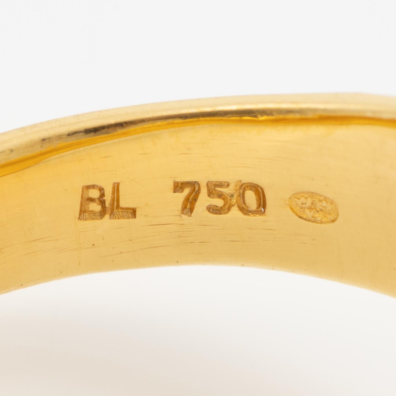Ring 18K guld med en rund briljantslipad diamant.
